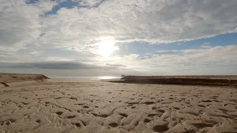 Walking towards the edge of the beach Stock Footage 227186531