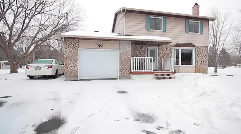 Walking towards house while it snows Stock Footage 60267418