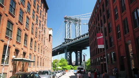 Walking towards Manhattan Bridge in Dumbo Brooklyn in New York City Stock Footage 131660997