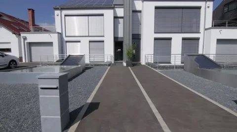 Walking towards modern house Stock Footage 53080575