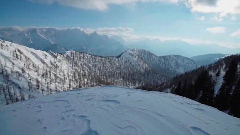Walking towards a mountain cliff in the alps Stock Footage 102579094