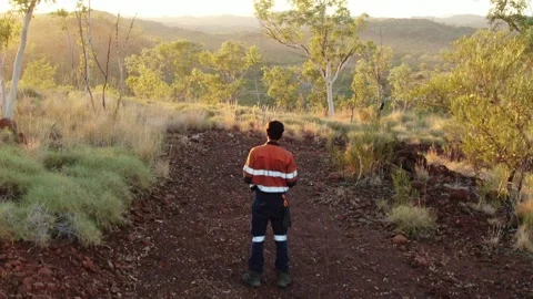 Walking Track in Hi Vis at Sunrise in Outback Kimberley, Western Australia Stock Footage