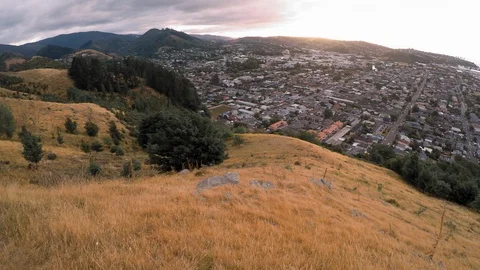 Walking trail overlooking Nelson New Zealand, on an cloudy afternoon before dusk Stock Footage 113493018