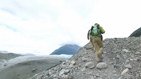 Walking Trail Root Glacier Hikers POV in Alaksa Wrangell St. Elias 스톡 동영상 121540232