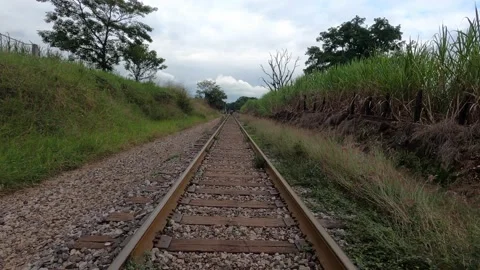 Walking into the train tracks Stock Footage 146035224
