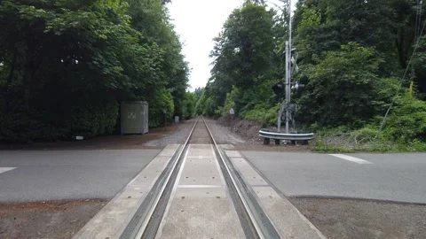 Walking on train tracks towards the forest alone Stock-Footage 133472890