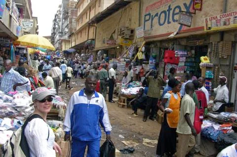 Walking trough the streets of Kampala City. Stock Photos