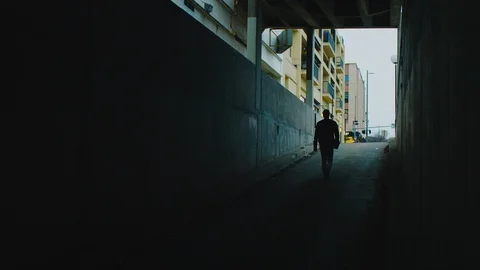 Walking in Tunnel Toward Light Stock Footage 102871440