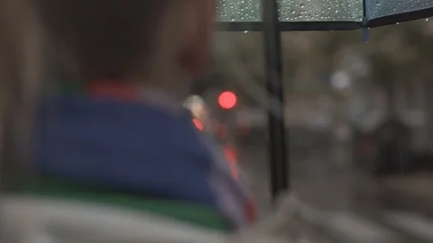 Walking with umbrella under the rain Stock Footage 124622931