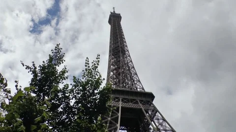 Walking Under the Eiffel Tower In Paris On A Bright Summers Day Stock Footage 72121170