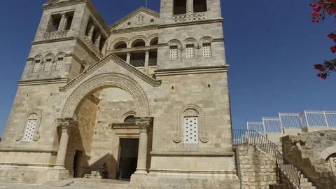 Walking Underneath Tree To Reveal Towering Church Stock Footage 77771941