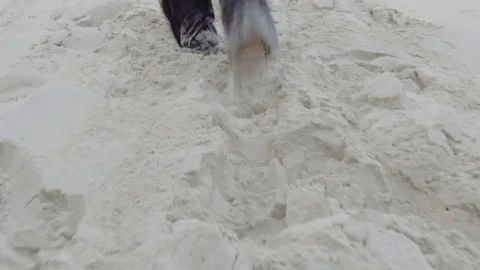 Walking uphill in deep sand Stock-Footage 75699403