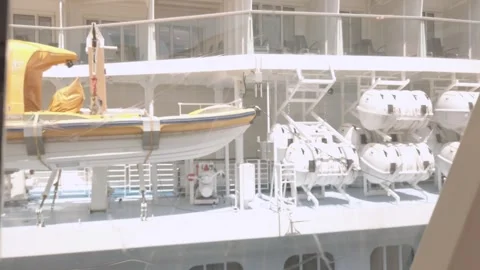 Walking view on boarding bridge to get on into the passenger cruise ship ga.. 動画素材 311058997
