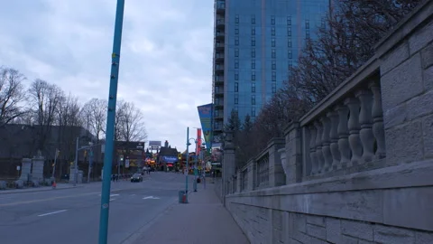 Walking View of Niagara Falls Down Town Street Stock Footage 130881359
