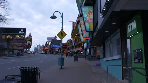 Walking View of Niagara Falls Down Main Town Street 4k Video stock 130881930