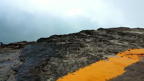 Walking view on rock cliff to the top of the mountain after rain.  Stock Footage 91769205
