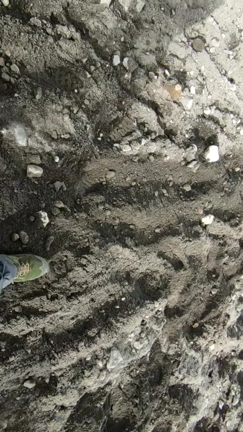 Walking volcanic sand Stock Footage 307790101