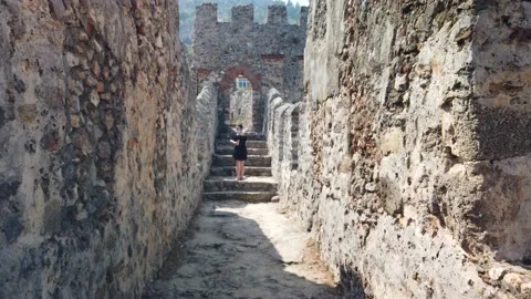 Walking on the walls of an old castle and fortress in Alanya, Turkey Stock Footage 142691237