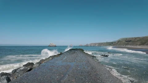 Walking on wave break in california Video stock 308951865