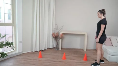 Walking Weave Through Cones Backward Stock Footage 314190579