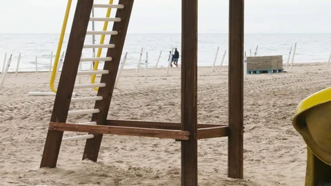Walking on a winter beach in front of the ocean Stock Footage 117466088