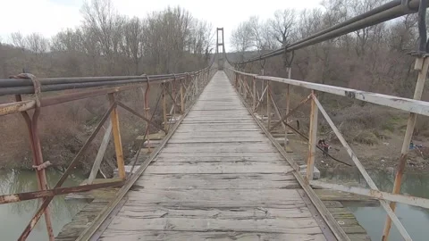 Walking on the wooden bridge Stock Footage 160624791