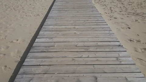 Walking on wooden path on the beach dune 스톡 동영상 96143624