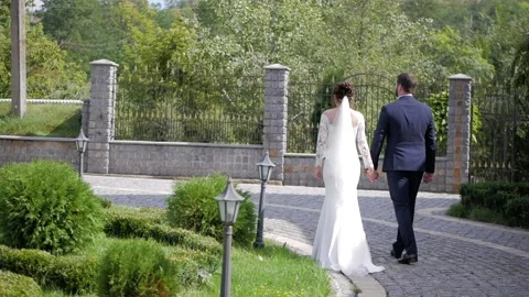 Walking of young wedding couple. Stock Footage 101154405