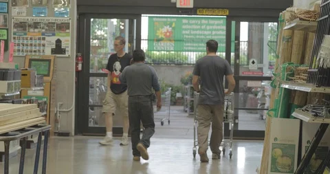 WalkingOutOfStore Stock Footage 88838667