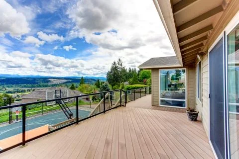 Walkout deck with backyard view Stock Photos