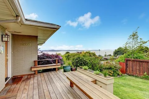 Walkout deck with water view Stock Photos