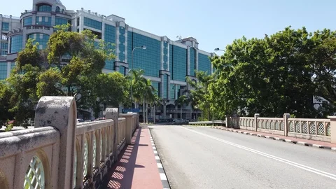 Walkthrough pathway with car pass by one of Gadong road. Stock Footage 105401518
