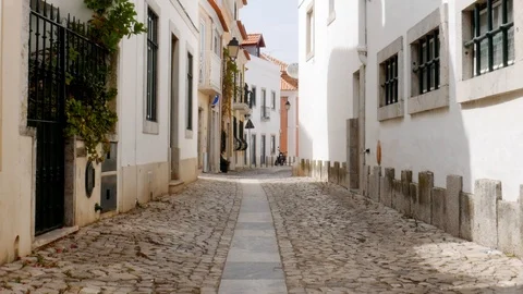 Walkthrough of tourist exploring historic centre of Cascais, Portugal Stock Footage 112293495