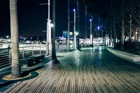 Walkway along the waterfront at night, in Long Beach, California. Stock Photos