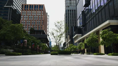 Walkway with columns and greenery outside One Bangkok mall Stock Footage 345956846