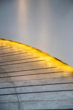 Walkway with light under wall Stock Photos