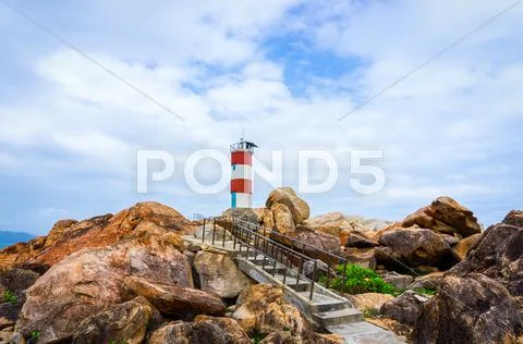 Walkway to lighthouse Stock Photos