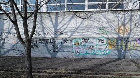 The wall of the abandoned surrender painted with tags graffiti can with paint Stock Footage 124257125