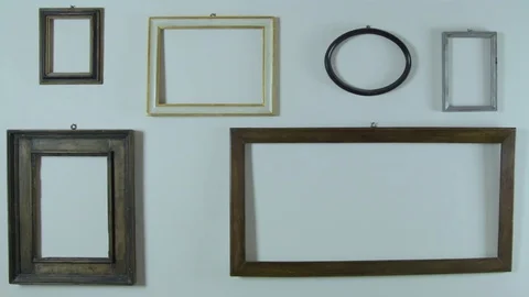 Wall with ancient empty frames Stock Footage 78064403