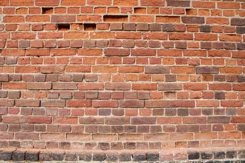 Wall of ancient red brick Stock Photos
