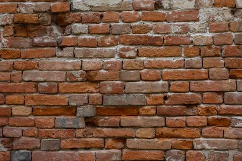 Wall with ancient red bricks. 스톡 사진
