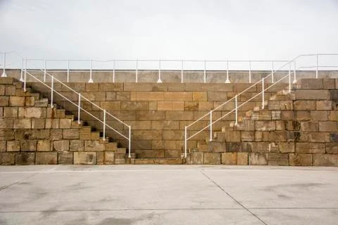 Wall and railing with sunlight Stock Photos