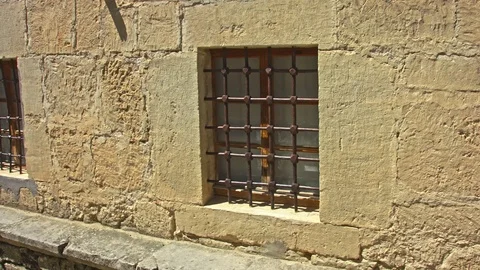 The wall and windows and courtyard of the old house Video stock 80403861