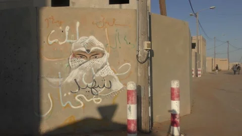 Wall art mural of Hamas on display at the Tze'elim urban warfare base Israel 스톡 동영상 252986745