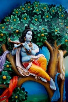 Wall art or mural of Indian Hindu God Krishna in a temple Stock Photos
