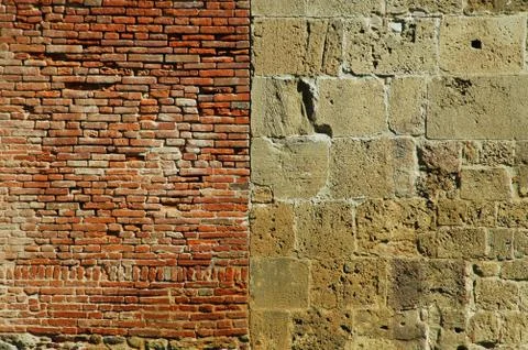 Wall background. Brick and stone. Stock Photos