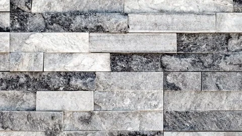 Wall background, lined with flat long granite tales Stock Footage 243990378