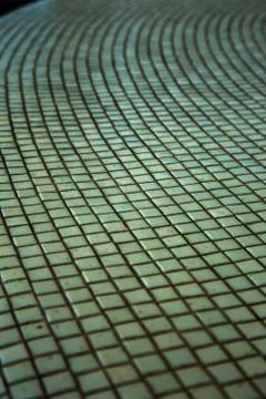 Wall background with an old ruined ceramic Venetian mosaic. Background of a w Foto stock