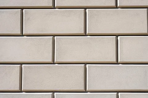 Wall with beige stone slabs Stock Photos