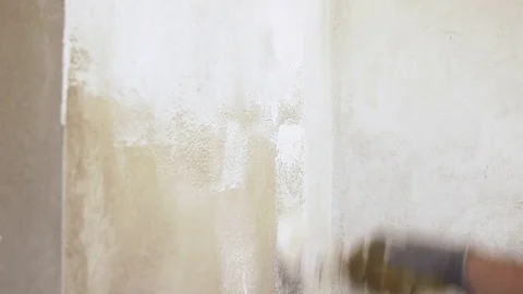 Wall being painted with lime paint Stock Footage 71085050